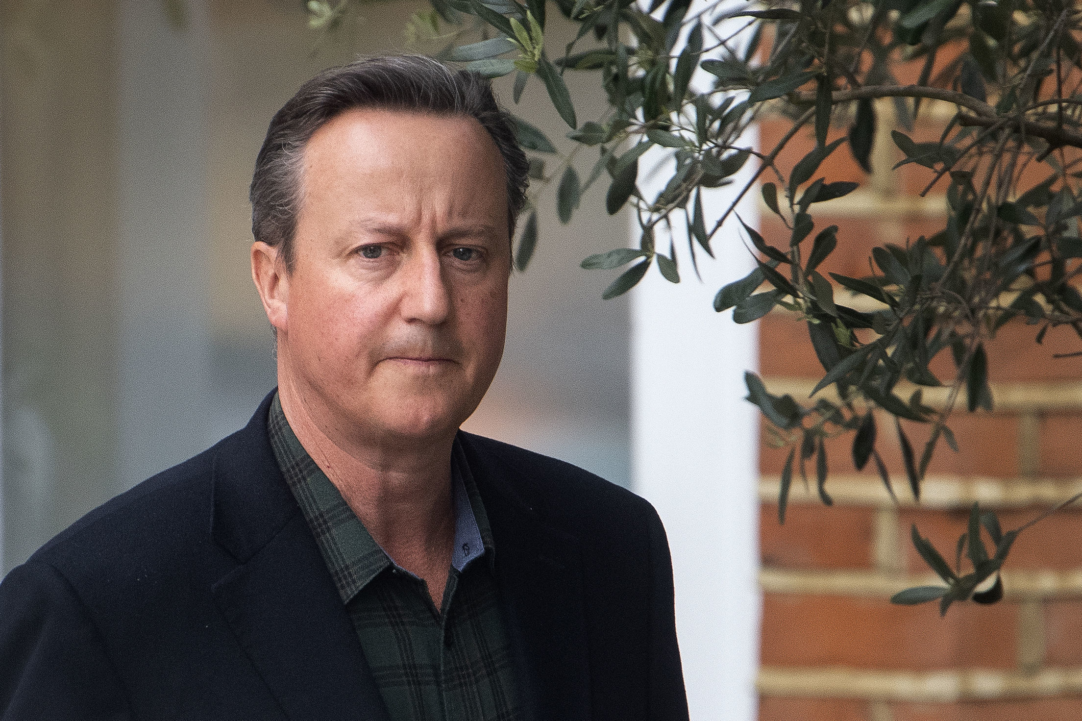 David Cameron leaves his home in London ahead of giving evidence to the Commons Treasury Committee on Greensill Capital. Picture date: Thursday May 13, 2021. PA Photo. See PA story POLITICS Cameron. Photo credit should read: Victoria Jones/PA Wire 